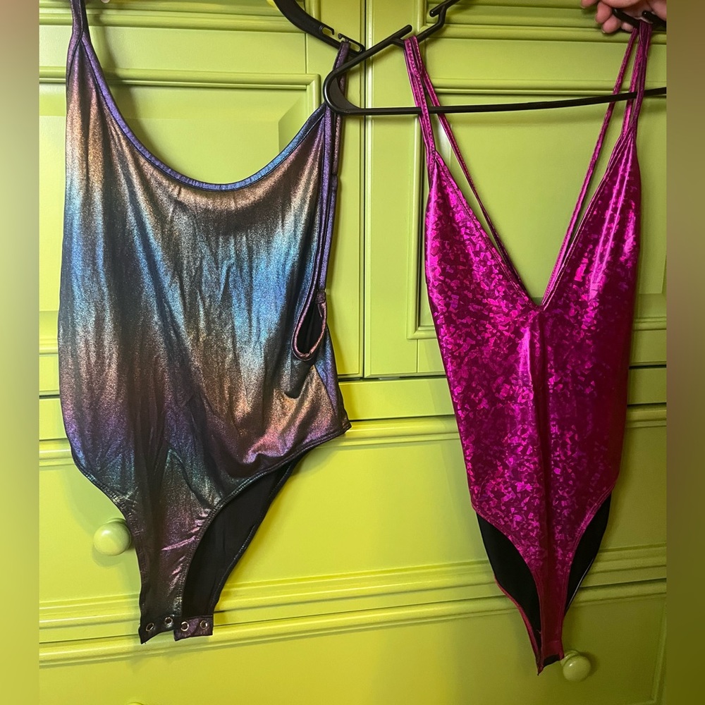 Two iridescent body suits